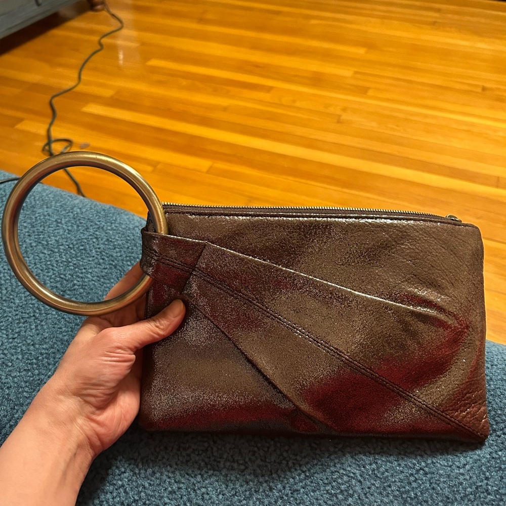Sheila Ring Clutch
Metallic Leather Coffee Galaxy